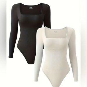A white and black bodysuit